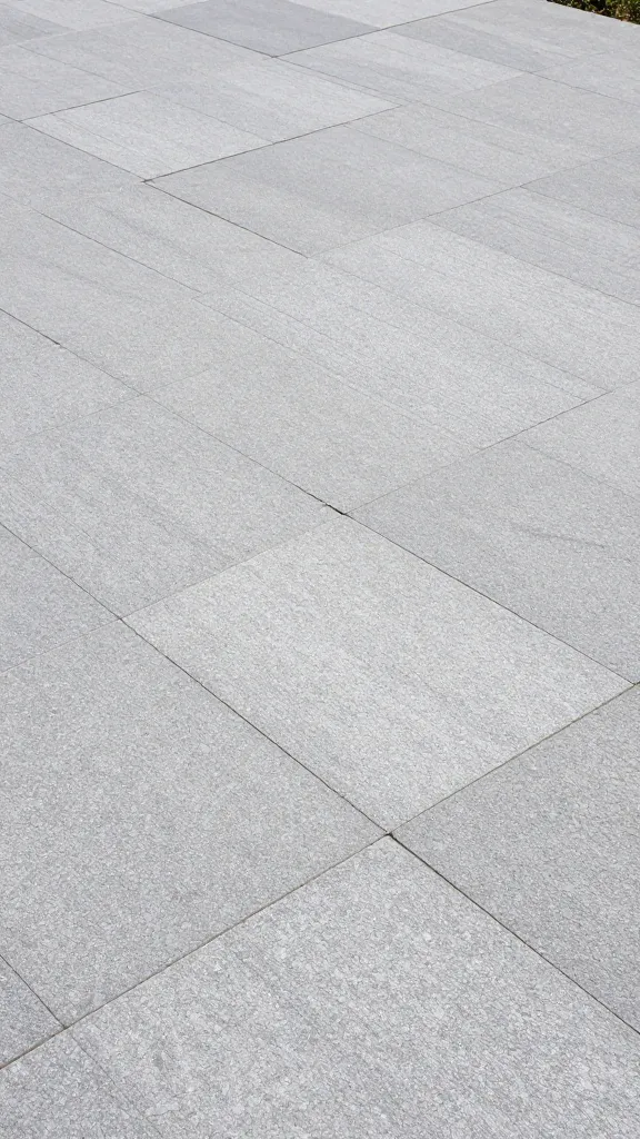 How to Landscape a Backyard from Scratch 3 Modern stone patio with geometric pavers overhead view